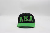 AKA Black Letters Snapback Hat