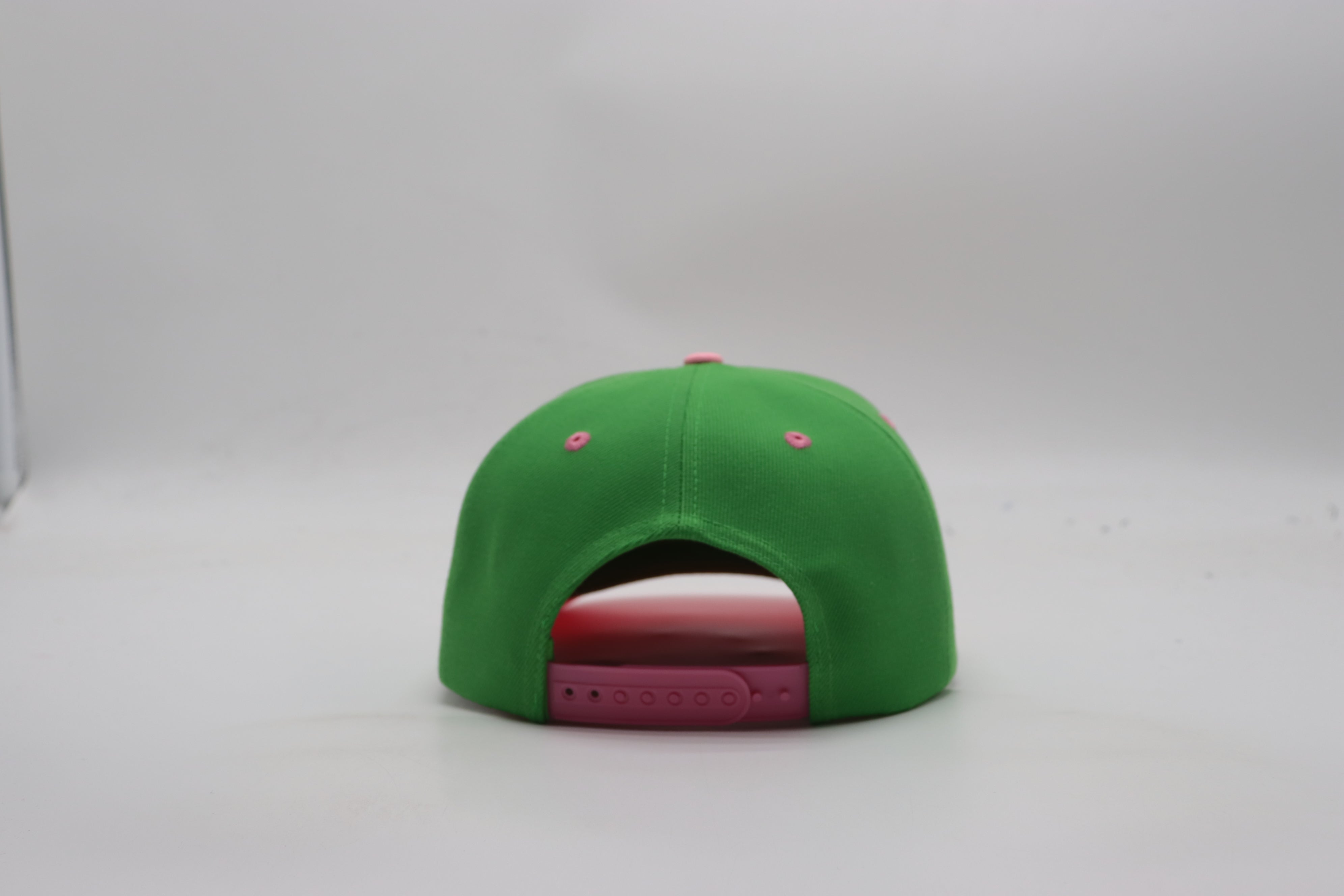 AKA Green Letters Snapback Hat