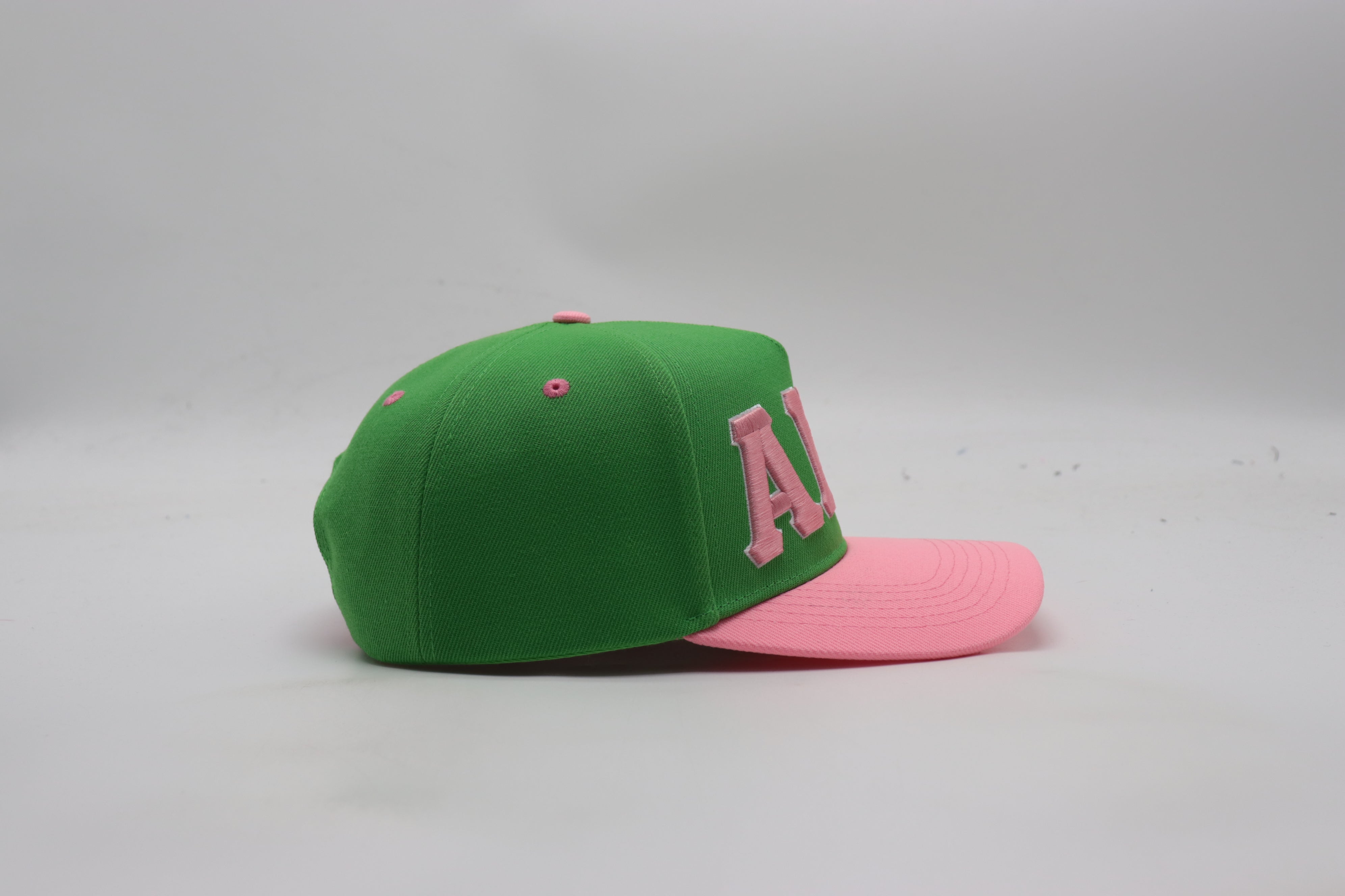 AKA Green Letters Snapback Hat