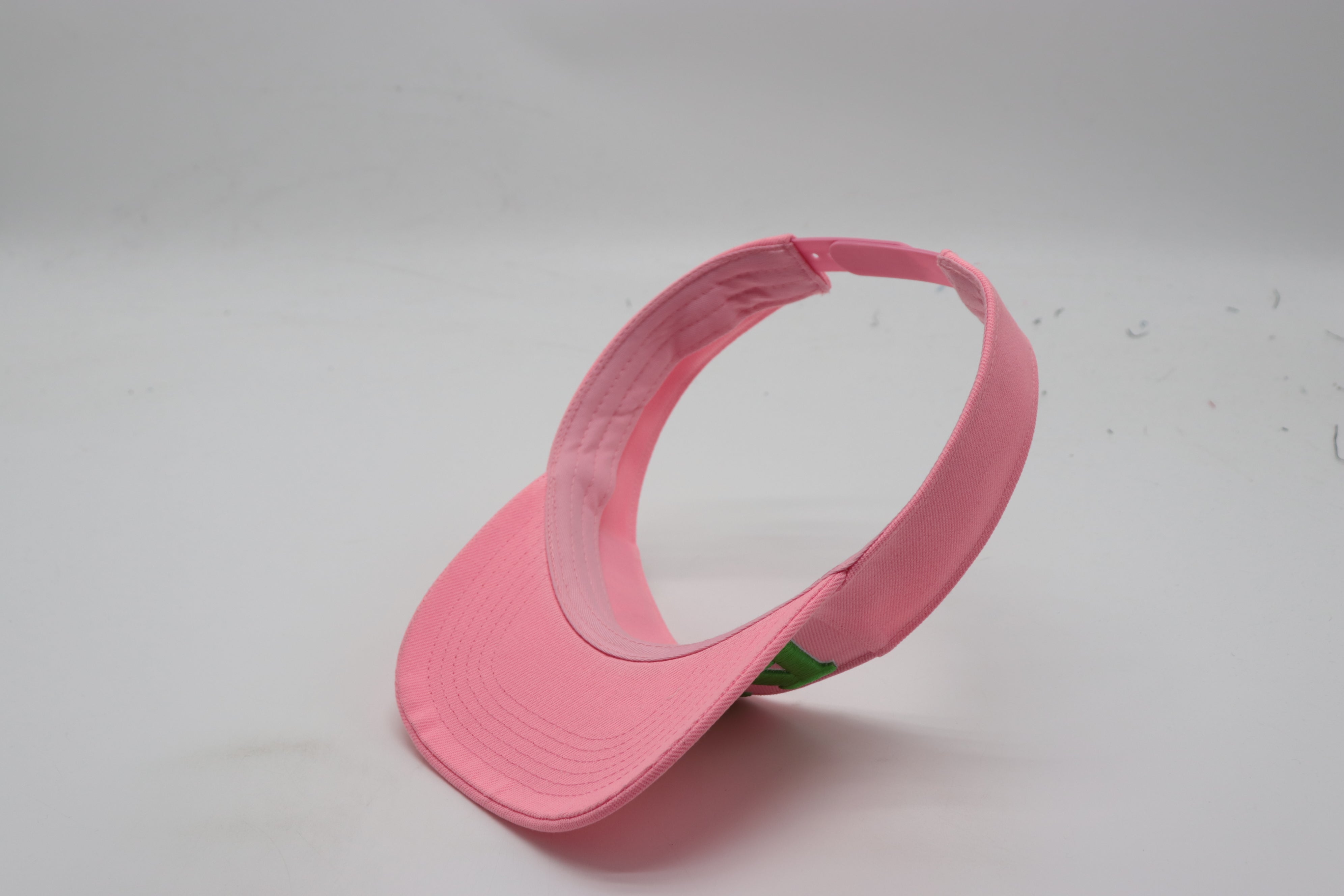 AKA Pink Letters Visor Hat