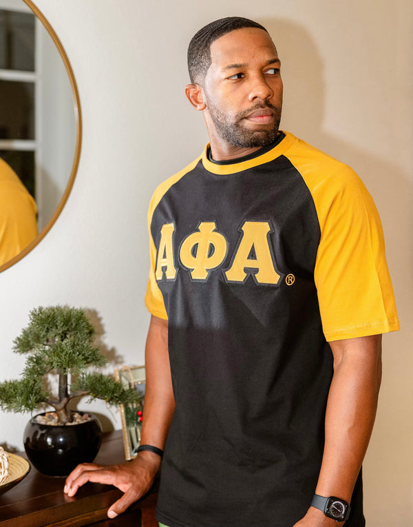 Premium Alpha Black And Old Gold Raglan Tshirt