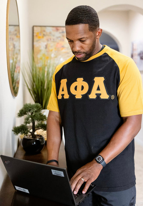 Premium Alpha Black And Old Gold Raglan Tshirt
