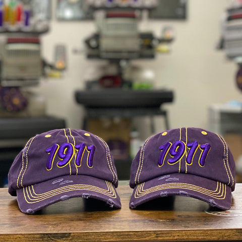 “1911” Omega Purple & Old Gold Stitch Distressed Hat