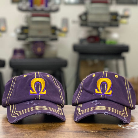 “Ω” Purple & Old Gold Stitch Distressed Hat