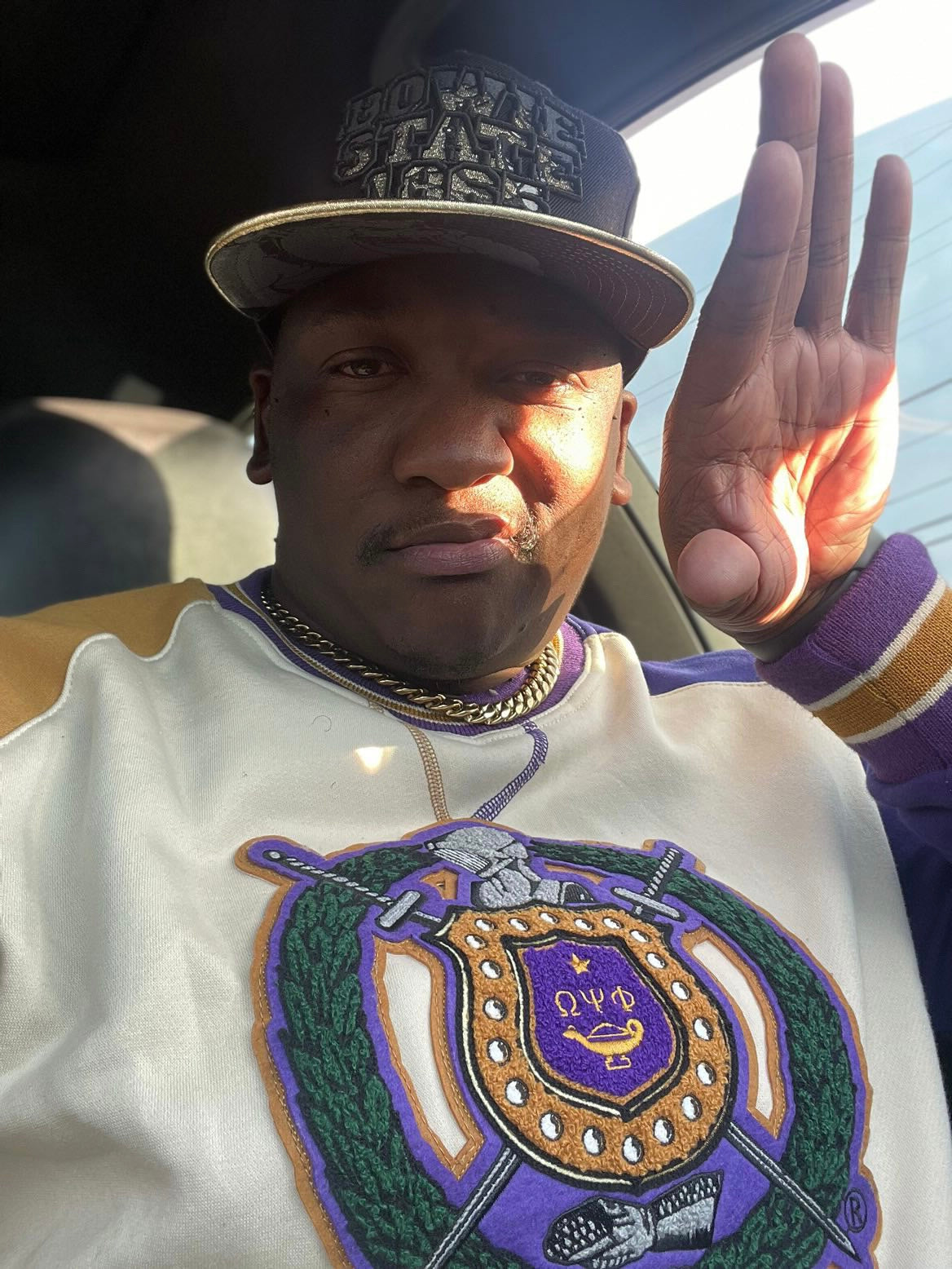Omega Opposite Sleeve Crest Chenille Crewneck