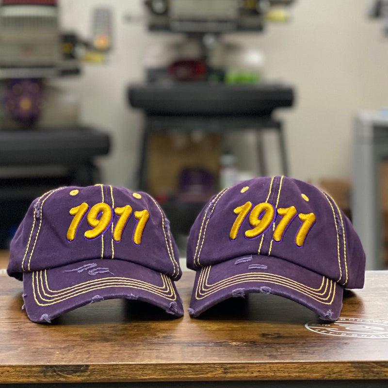 “1911” Omega Purple & Old Gold Stitch Distressed Hat