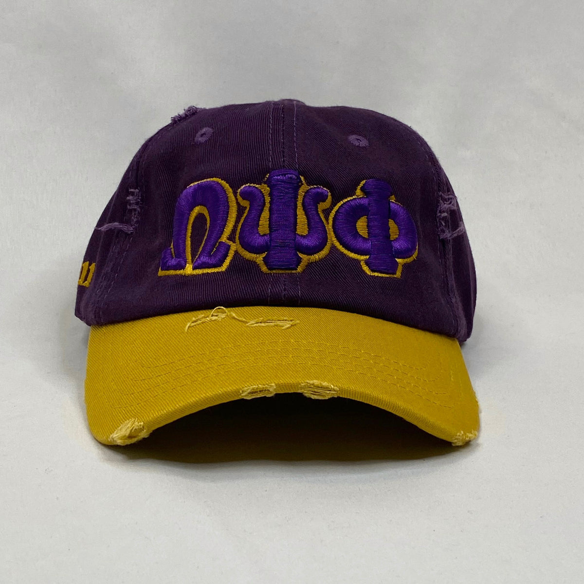 “ΩΨΦ” Omega Psi Phi Purple & Old Gold distressed hat